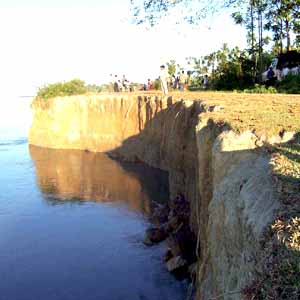 erosion - A view of heavy erosion caused by the mighty Brahmaputra in Assam(India).