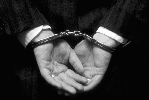 man in handcuffs - a man who is in handcuffs