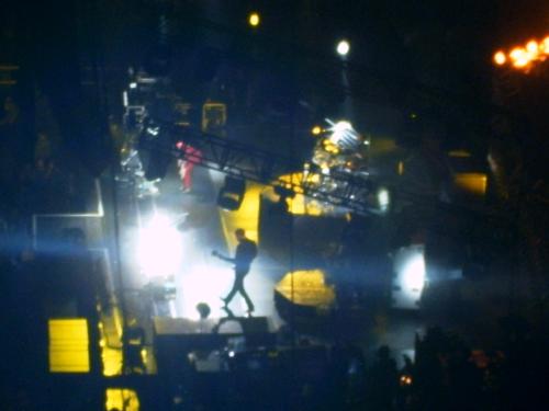 Muse Concert - This is a picture from a Muse concert in Madison Square Garden in August 2007. Matt is wearing a red suit on the far left, Chris is strumming bass in the front, and Dom... well he's in the back