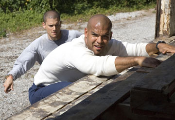 Season 2 when They have just escaped - Sucre is helping Michael onto the train as they narrowly escape the guards and bellick who almost had the 12 escapees caught.
