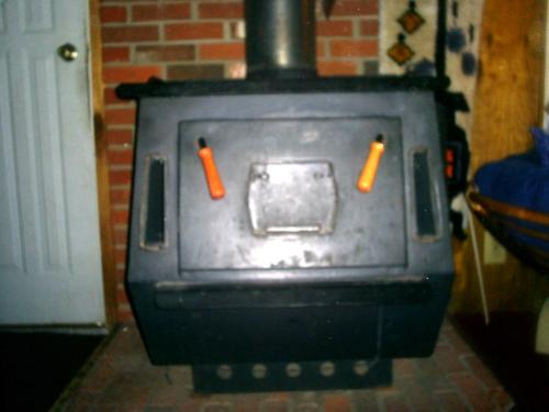 wood burning stove - wood burning stove I would love to get rid of, but husband now says he wants to burn again..*rolls eyes*