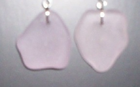 Amethyst Beach Glass Earrings - The beach glass was found in northern California. Amethyst is among the rarer colors of beach glass and these gems were of jewlery-quality. They are stunning in the sunlight, as they sparkle when the light catches them. You will get many compliments with thse awesome earrings!