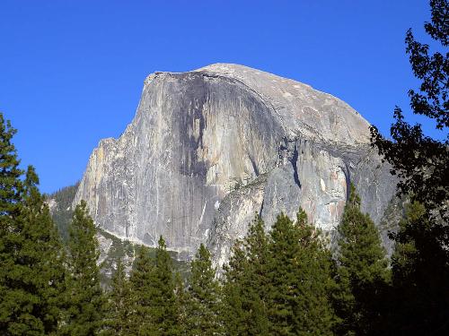 Half Dome - Half Dome is the highest point in Yosemite, though not the largest single hunk of granite. That title belongs to El Capitan.