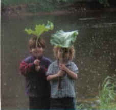 My rugrats - Gabe and Adrian playing in the rain. Just loving life.
