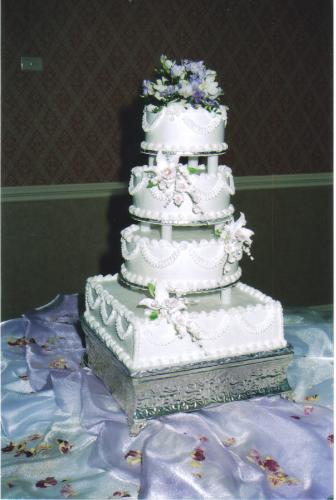 wedding cake - white cake with bavarian cream filling and whipped cream icing.