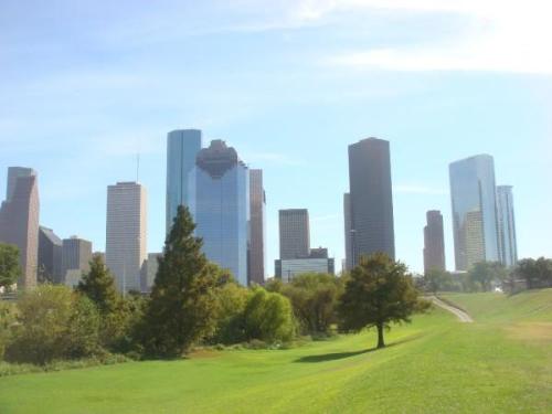 Downtown Houston - This is a picture of Downtown Houston. It was a good weather day that day. My friend and I went out to take pictures of Houston, because I was leaving to move back to Georgia and I like to keep my pictures for memory. I loved that day I have so many pictures of me trying to be a model with this beautiful background of Downtown Houston. It's a great place to go visit one day.