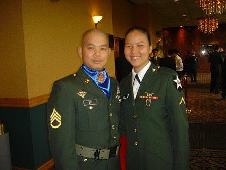 Army Dad - This is a picture of me in Korea at a what they call a Dining in event. I am dress in what is my Class A's but since it is a Dining In instead of wearing our usually green under shirt we wear the white one as shown. Also in the picture with me is my Army Dad, well I call him that because he took good care of me while I was stationed in Korea. He is wearing something a little different because he has to work with the color guard.