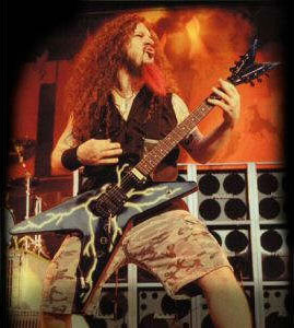 guitar - this is a picture of dimebag darrell playing his signature model guitar