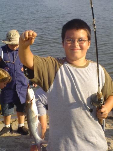 I caught this! - This is my nephew. We went on a fishing/campout with the cubscouts and boyscouts. He took his great grandfathers fishing pole and caught 10 fish that day. The most of all of us including adults. My grandfather was an avid fisherman. We think he was helping his great grandson that day!