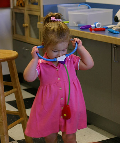 What profession do you want your children to be in - A picture of a girl playing with a stethoscope. Photo source: http://farm2.static.flickr.com/1278/539984067_63b7fe10b0.jpg?v=0 .