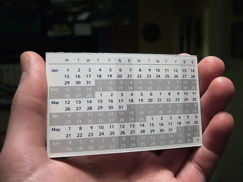 Which is your FAVORITE day of the week? - A picture of a hand holding a pocket calendar. Photo source: http://farm1.static.flickr.com/105/367425390_722352b6ac.jpg?v=1169598369 .