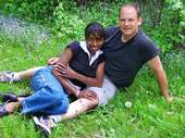 Love in the Country - A happy couple, relaxing in the outdoors...being loving