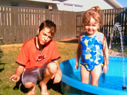 kids - my kids in the pool in summer