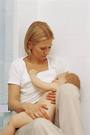 Breastfeeding - mother breastfeeding her child