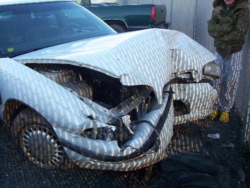 Car Accident - Our car as it sits at the towing company waiting for it&#039;s final destination: the auction!