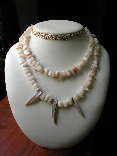 Mother-of-Pearl Necklaces - These necklaces are approximatly 15 inches long and are knotted between every bead.