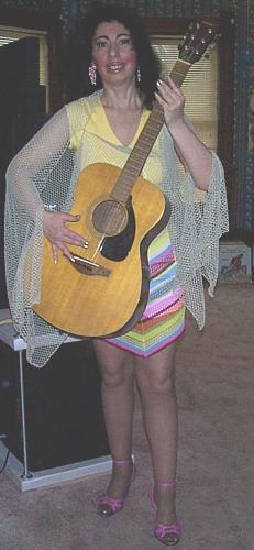 Singing In The Sunshine - This is me last March posing with my guitar.