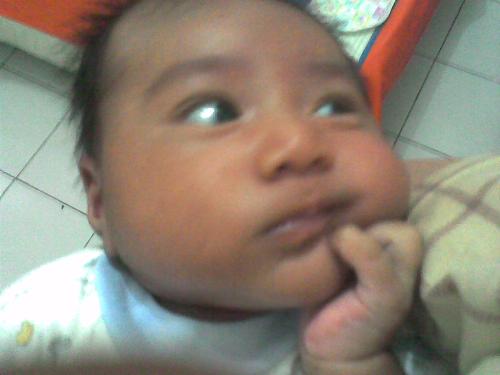 the thinker - this is my little Ezi.. my first 2 months old boy.. look how he is like in deep thinking...
