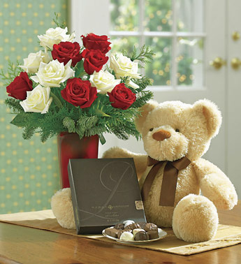 Birthday Gift To Transdisc - image of teddy bear and flowers
