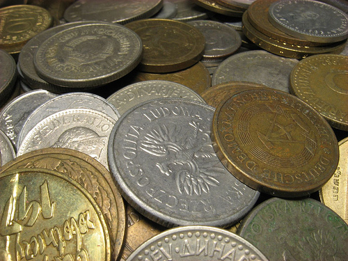 Will you return a WRONG change? - A picture of some coins. Photo source: http://farm1.static.flickr.com/149/350862938_119d5c59a6.jpg?v=0 .