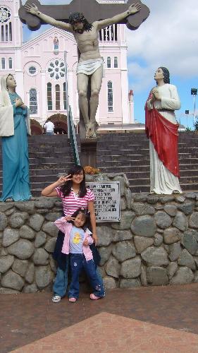 my daughter - taking picture at the church of baguio city