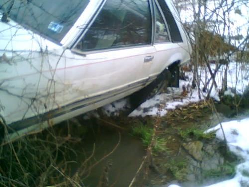 my car in the creek - This is where my car landed after sliding backwards down the driveway on the ice Sunday night (12-09-07)