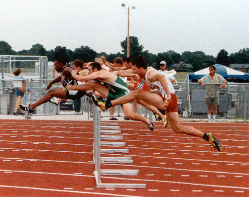Will you walk or dash the last 100 miles? - A picture of a group of athletes jumping across the hurdle. Photo source: http://farm1.static.flickr.com/204/482368264_d07634659f.jpg?v=0 .