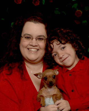 Shannon, Andrew & Mariska - Andrew and I went and got our pictures taken for Christmas at Wal-Mart last weekend. We were even able to get the dog in on the fun. Might as well, I told Andrew the other day she is the only sister he's ever going to have. LOL