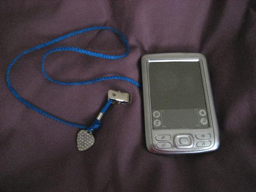 My PDA with its own BLING! - My beloved Palm Zire 72 complete with tether, clip, and its own jewelry.