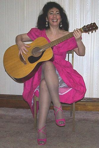 Love My Guitar - This is me dressed in an old dress with the guitar on my knees.