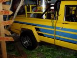 Truck from the movie Twister with dorothy - I love this moivie if only I could think of a discussion. this was a great idea to have dorothy.