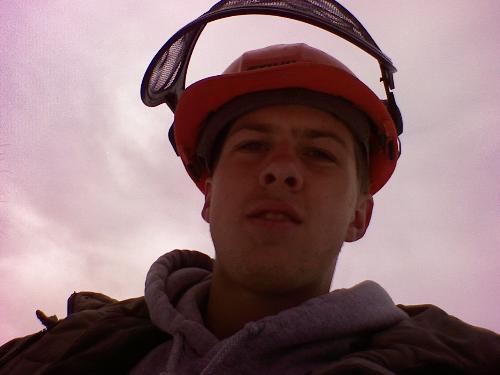 Me with a woodcutting helmet on - This was taken the day that we went out and cut trees as part of our chainsaw course.