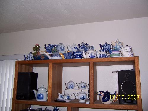 My teapot collection which is sitting on top of my - Part of my teapot collection