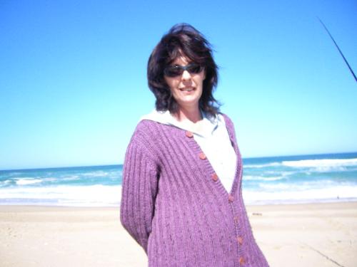 Me on a very windy day! - On the beach. It was very windy, but still nice.