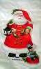 Sant on his way to Bob's - Santa carrying a bag with new slippers for Grandpa Bob!