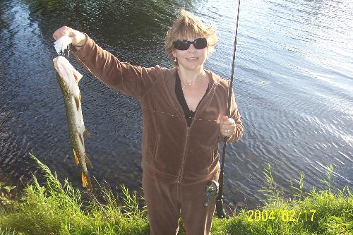 Deb fishing - caught a pike while fishing this summer.