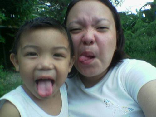 funny face - I just love taking pics of me and my nephew. He's so adorable i wish he's mine.