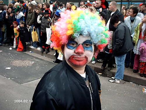 Alex in color. - Here is my friend's son with colors in a street somewhere in Germany during a festival. Ja ja ja.