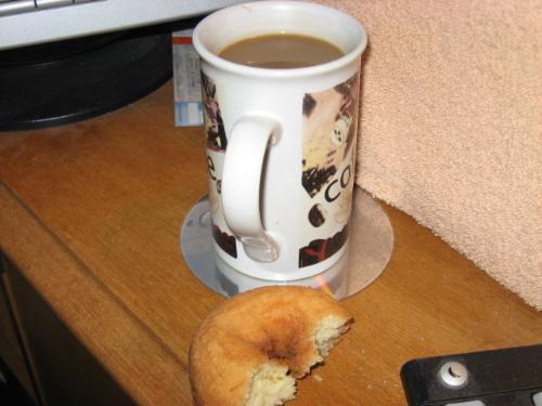 Snacking At The Puter - coffee and donut for a snack