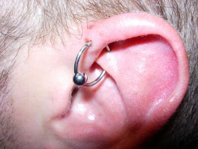 Body piercing - IT is painful at time of piercing. But afterwards becomes part of your body.