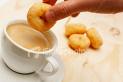 The Donut Dunk - Dunking Donuts into tea or coffee.