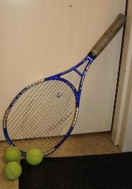 Tennis - Tennis racket and balls.