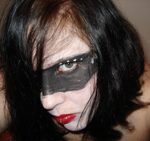 Me as a harlequin - I had so much fun dressing up for this photo. I had just gotten some face paint for halloween (I ended up going as a kinky harlequin, instead of a scepter I had a riding crop) and decided to take some photos. I really love the way they turned out.
