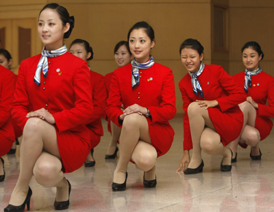 stewardesses's balancing test - good balancing acts,bright color,and great smiles