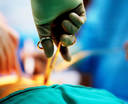 Plastic Surgery - A picture of a surgeon getting ready to operate
