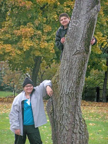 my kids - My daughter (standing) and son (up the tree LOL)