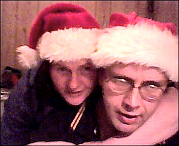 chris and me - chris and i wearing santa hats