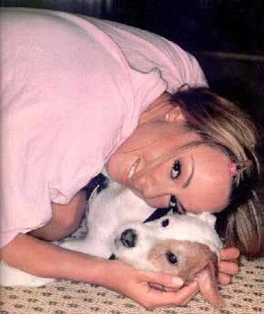 mariah carey - with her dog.. she really love her pets...