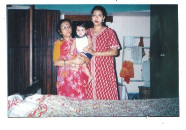 mom, my son & me - seven years back, my son aged 1 with my mom and me in my mom's bedroom