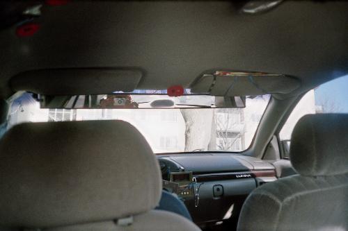 WW2 Canadian Veteran Memorial Poppy Display - WW2 Canadian Veteran Memorial Poppy Display in a Taxi on top of Interior-rear view-mirror
